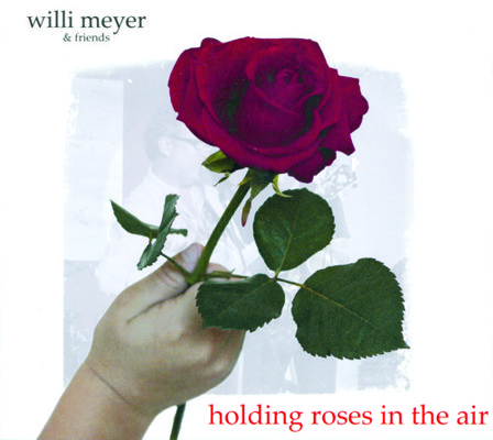 Willi_Meyer_holding_roses_in_the-air_(1)